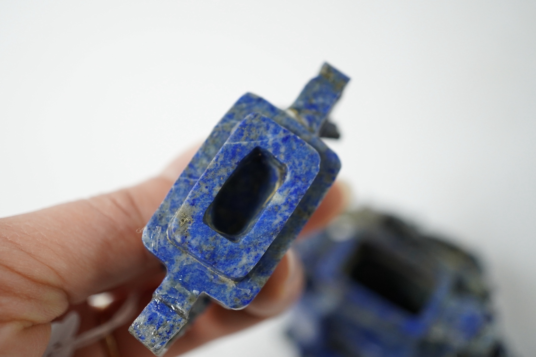 A Chinese lapis lazuli vase and cover, late 19th/early 20th century, 14cm high. Condition - fair, minor chips